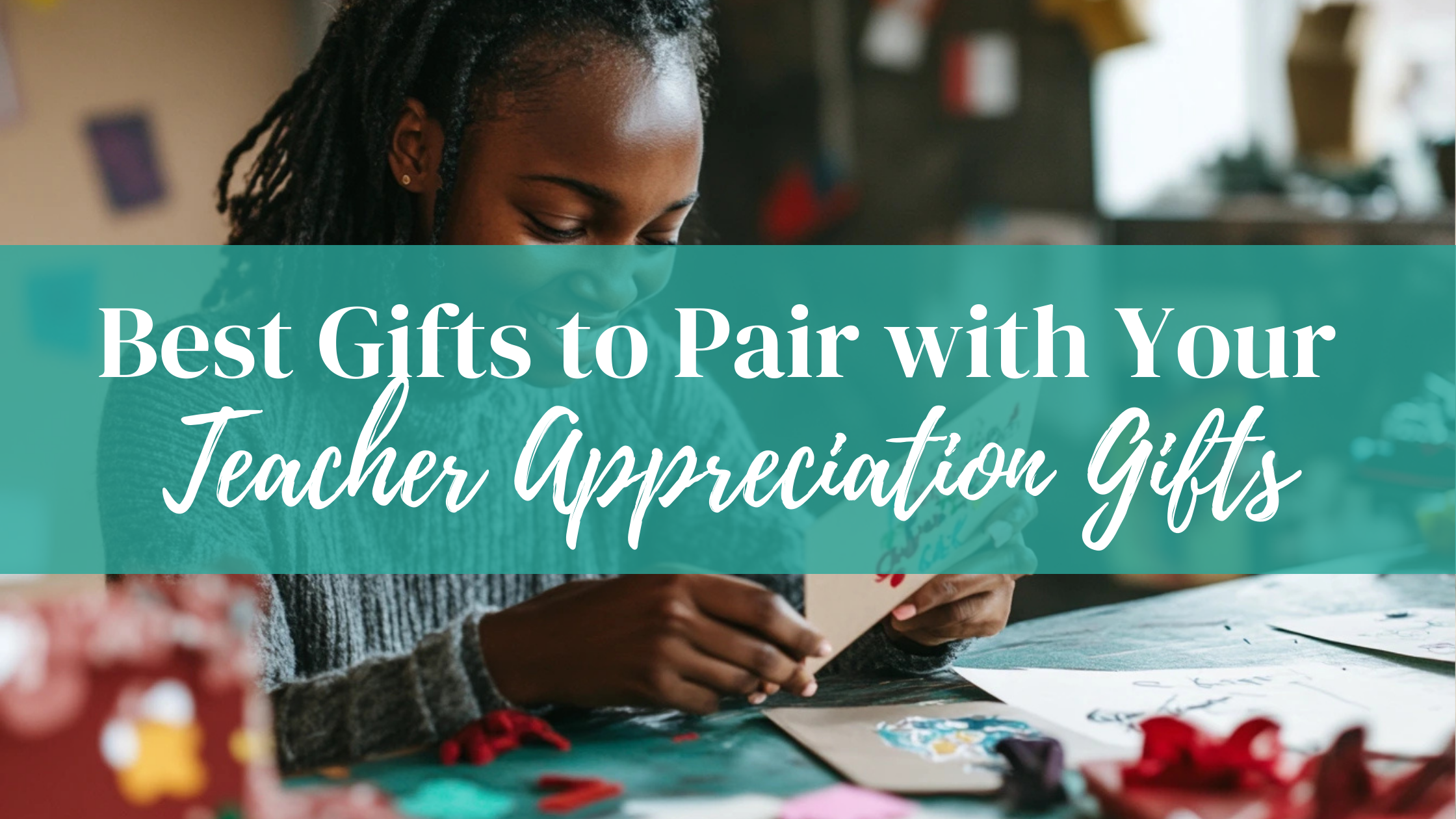 Featured Image of Blog post about gifts and teacher appreciation. Teacher at desk opening cards from students